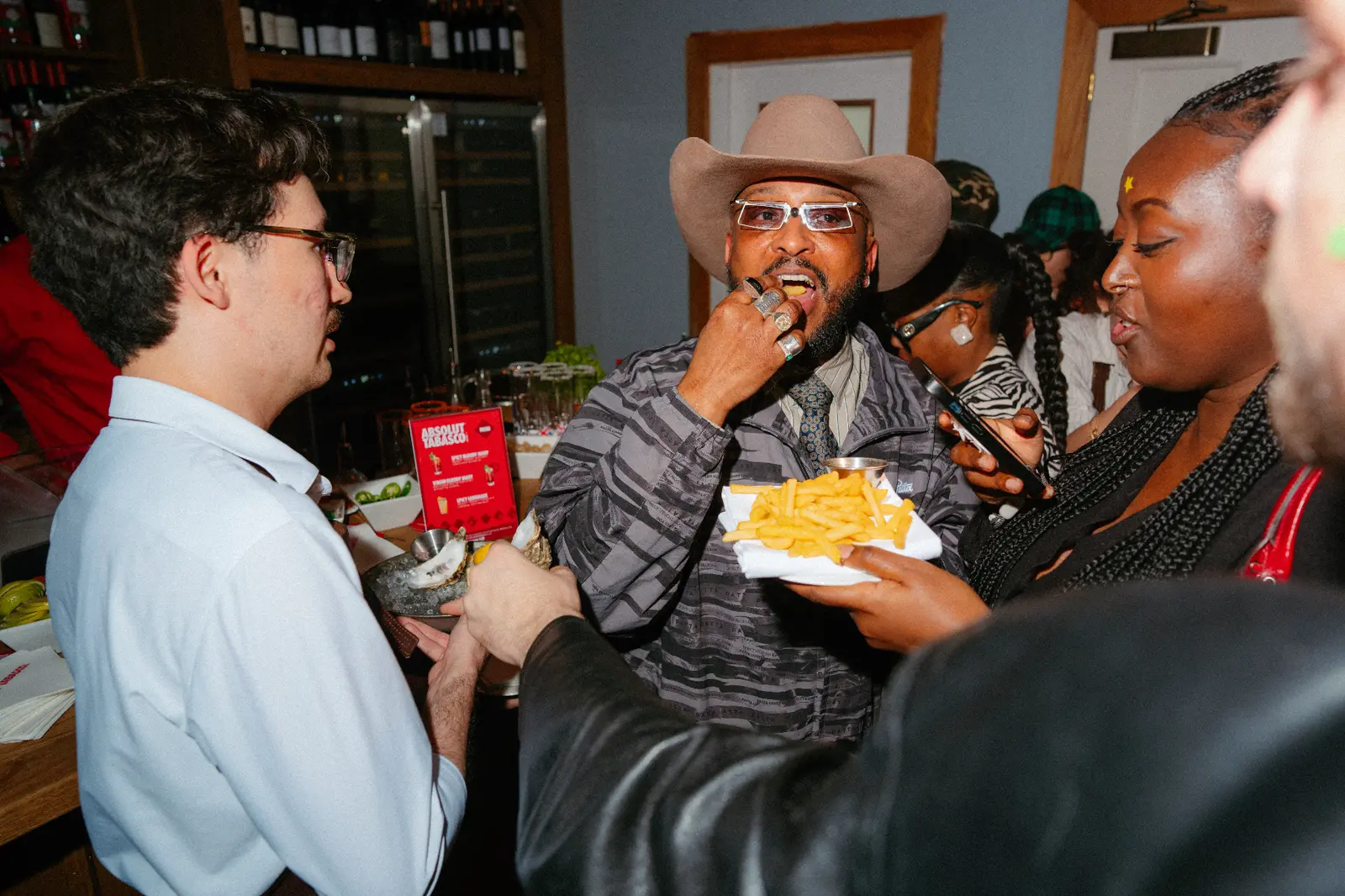 Guests tasting Absolut Tabasco at the UK launch party
